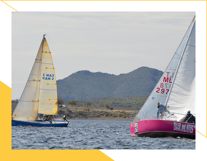 Yachts at Sailing Regatta in the Wind Through the Waves