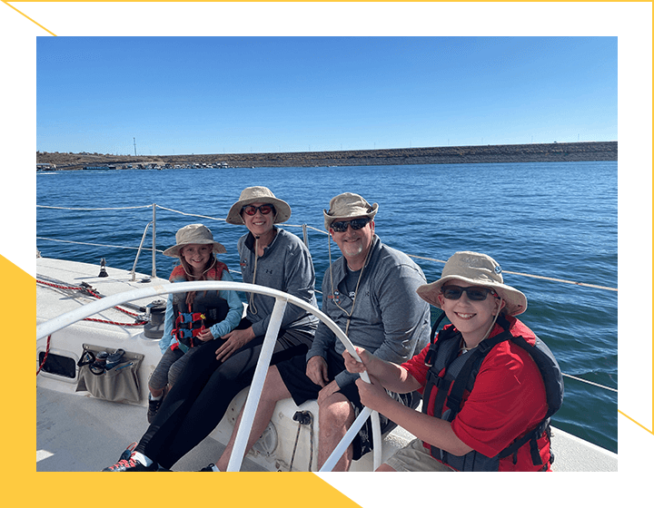 Family Enjoying in the Sailboat